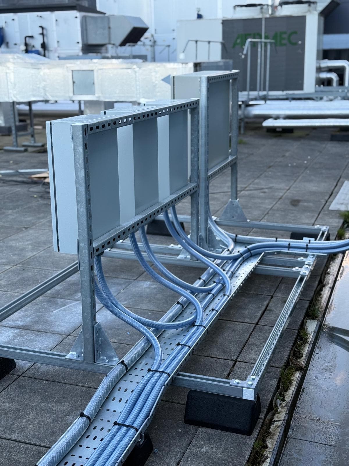 Rooftop cable containment and air-handling units installed by GEO Electrical